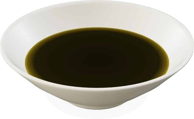 Green Diamond olive oil in a white bowl: deep olive, almost black